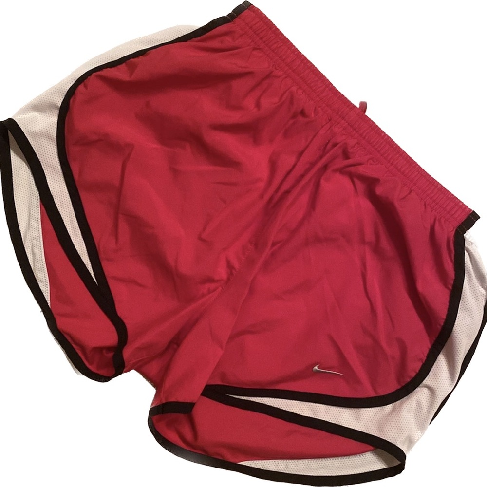 Women’s Nike Dri Fit shorts in pink with white and black size medium